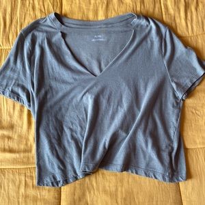 Green blouse with collarbone strip